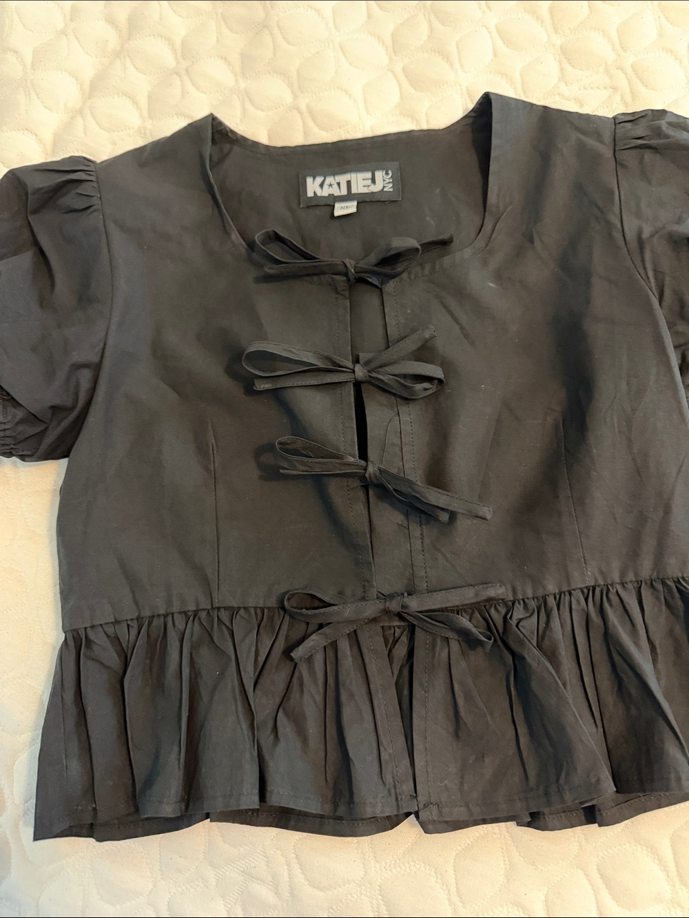 Katie J NYC Black Tie-Front Peplum Blouse
